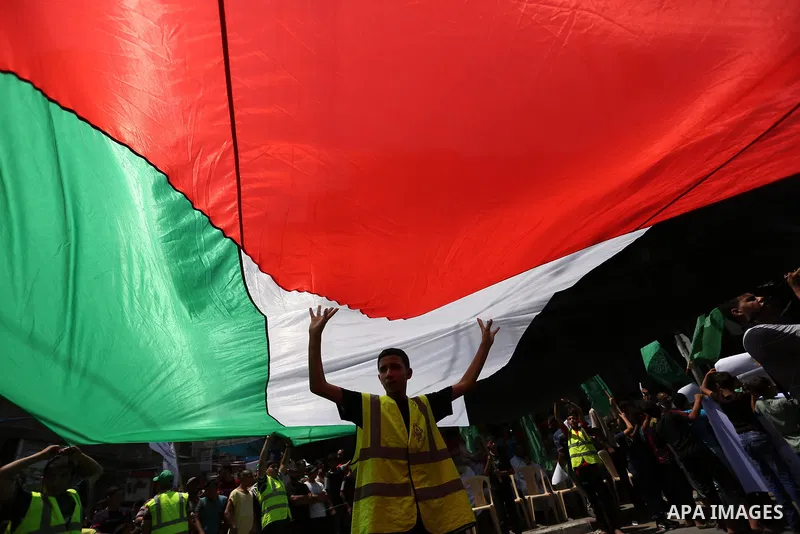 Palestinian demonstrators take part in a protest against Israel's new security measures at the entrance to the al-Aqsa mosque compound, which include metal detectors and cameras, in Khan Younis in the the southern Gaza s...
