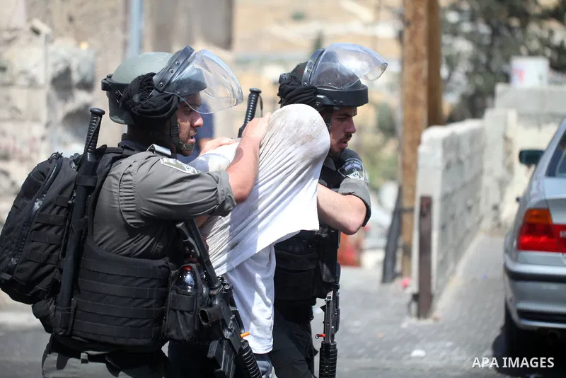 Israeli security forces detain a Palestinian protester during clashes following Friday prayer outside Jerusalem's Old City on July 21, 2017, after Israeli police barred men under 50 from entering the Old City for Friday...