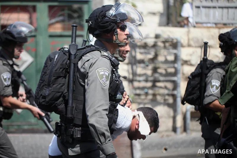 Israeli security forces detain a Palestinian protester during clashes following Friday prayer outside Jerusalem's Old City on July 21, 2017, after Israeli police barred men under 50 from entering the Old City for Friday...
