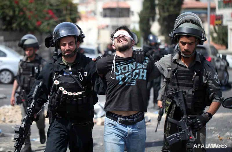 Israeli security forces detain a Palestinian protester during clashes following Friday prayer outside Jerusalem's Old City on July 21, 2017, after Israeli police barred men under 50 from entering the Old City for Friday...