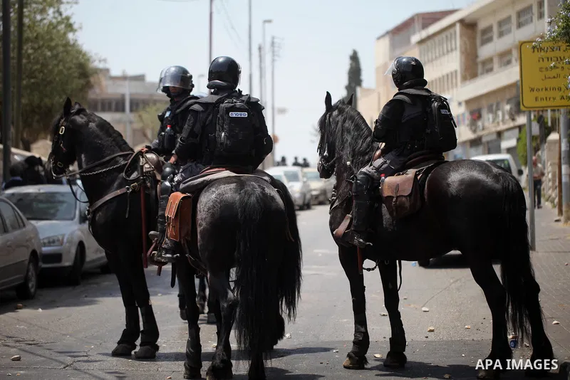 Horse mounted Israeli security forces patrol during clashes with Palestinian protesters following Friday prayer outside Jerusalem's Old City on July 21, 2017, after Israeli police barred men under 50 from entering the Ol...