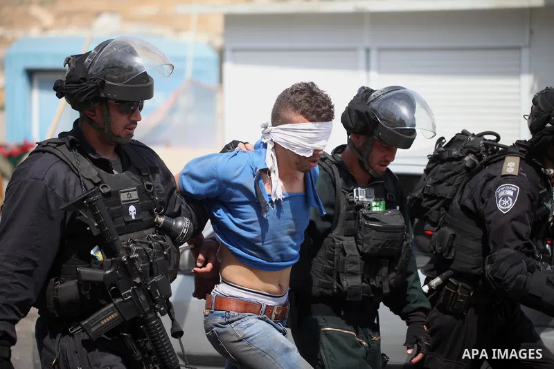 Israeli security forces detain a Palestinian protester during clashes following Friday prayer outside Jerusalem's Old City on July 21, 2017, after Israeli police barred men under 50 from entering the Old City for Friday...