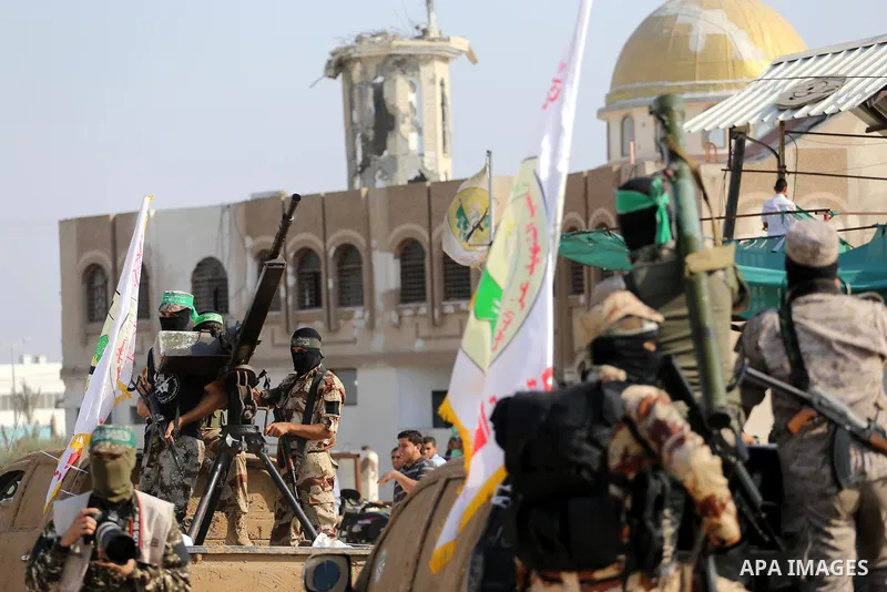 Palestinian Hamas militants take part in a military show against Israel's new security measures at the entrance to the al-Aqsa mosque compound, which include metal detectors and cameras, in Gaza city on July 21, 2017. Ph...