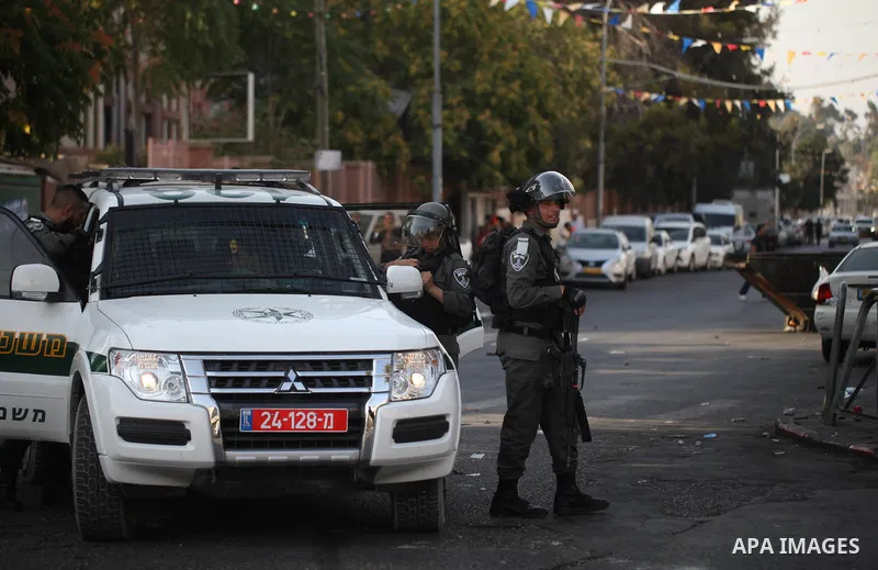 Israeli security forces take position during clashes with Palestinian protesters following Friday prayer outside Jerusalem's Old City on July 21, 2017, after Israeli police barred men under 50 from entering the Old City...