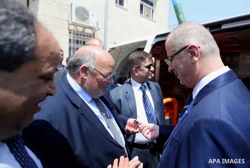 Palestinian Prime Minister Rami Hamdallah delivers an ambulance to Yasser Arafat hospital, in the West Bank city of Salfit on July 22, 2017. Photo by Prime Minister Office