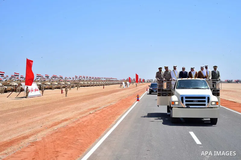 Egyptian President Abdel Fattah al-Sisi rides a vehicle with Arab leaders Sheikh Mohammed bin Zayed, Crown Prince of Abu Dhabi, Salman Bin Hamad Al Khalifa, Crown Prince of Bahrain, Prince Khalid Al-Faisal, Governor of M...