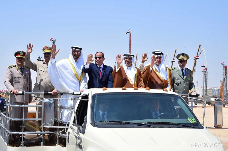 Egyptian President Abdel Fattah al-Sisi rides a vehicle with Arab leaders Sheikh Mohammed bin Zayed, Crown Prince of Abu Dhabi, Salman Bin Hamad Al Khalifa, Crown Prince of Bahrain, Prince Khalid Al-Faisal, Governor of M...