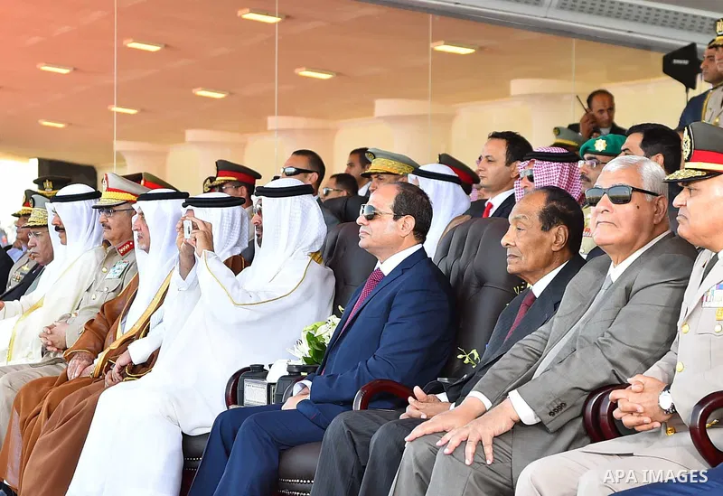 Egyptian President Abdel Fattah al-Sisi rides a vehicle with Arab leaders Sheikh Mohammed bin Zayed, Crown Prince of Abu Dhabi, Salman Bin Hamad Al Khalifa, Crown Prince of Bahrain, Prince Khalid Al-Faisal, Governor of M...
