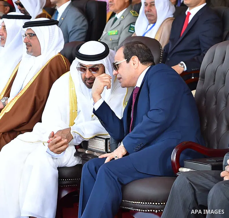 Egyptian President Abdel Fattah al-Sisi rides a vehicle with Arab leaders Sheikh Mohammed bin Zayed, Crown Prince of Abu Dhabi, Salman Bin Hamad Al Khalifa, Crown Prince of Bahrain, Prince Khalid Al-Faisal, Governor of M...