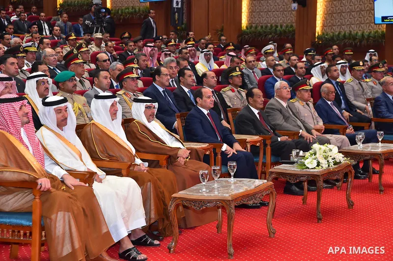 Egyptian President Abdel Fattah al-Sisi rides a vehicle with Arab leaders Sheikh Mohammed bin Zayed, Crown Prince of Abu Dhabi, Salman Bin Hamad Al Khalifa, Crown Prince of Bahrain, Prince Khalid Al-Faisal, Governor of M...