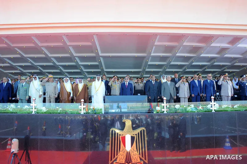 Egyptian President Abdel Fattah al-Sisi rides a vehicle with Arab leaders Sheikh Mohammed bin Zayed, Crown Prince of Abu Dhabi, Salman Bin Hamad Al Khalifa, Crown Prince of Bahrain, Prince Khalid Al-Faisal, Governor of M...