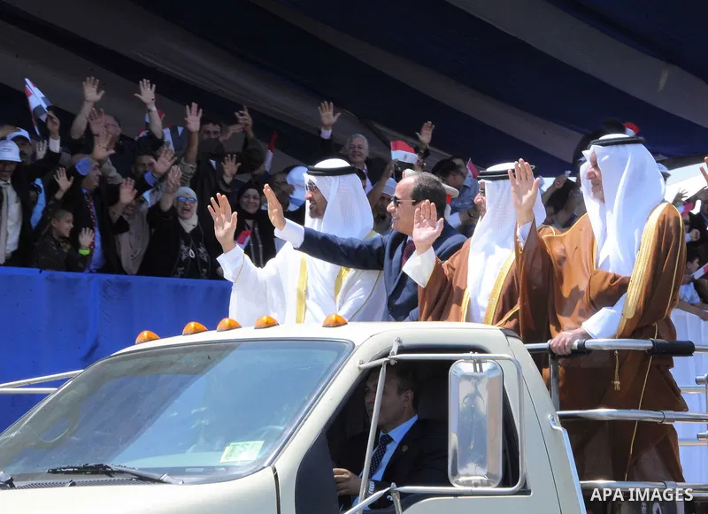 Egyptian President Abdel Fattah al-Sisi rides a vehicle with Arab leaders Sheikh Mohammed bin Zayed, Crown Prince of Abu Dhabi, Salman Bin Hamad Al Khalifa, Crown Prince of Bahrain, Prince Khalid Al-Faisal, Governor of M...