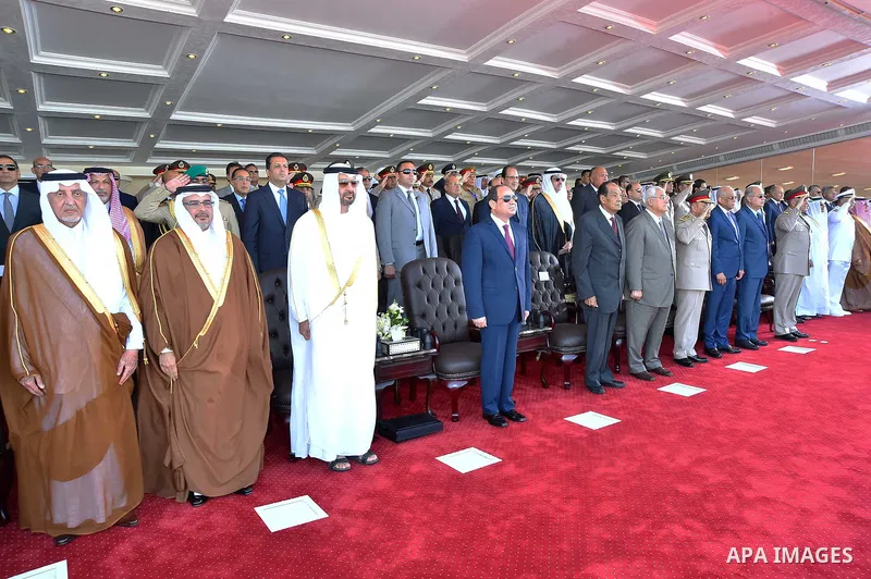 Egyptian President Abdel Fattah al-Sisi rides a vehicle with Arab leaders Sheikh Mohammed bin Zayed, Crown Prince of Abu Dhabi, Salman Bin Hamad Al Khalifa, Crown Prince of Bahrain, Prince Khalid Al-Faisal, Governor of M...