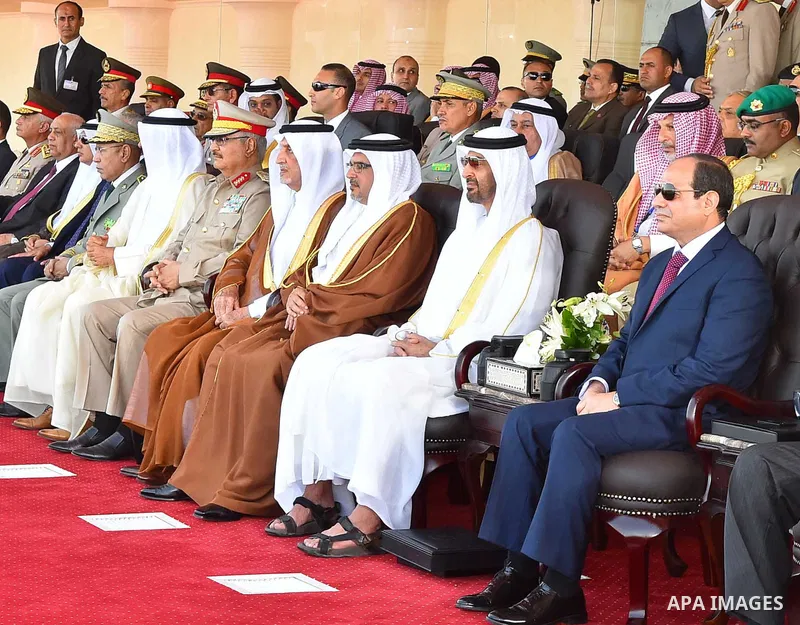 Egyptian President Abdel Fattah al-Sisi rides a vehicle with Arab leaders Sheikh Mohammed bin Zayed, Crown Prince of Abu Dhabi, Salman Bin Hamad Al Khalifa, Crown Prince of Bahrain, Prince Khalid Al-Faisal, Governor of M...