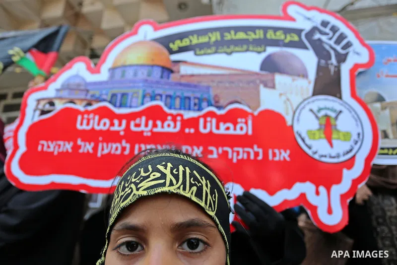 Palestinian supporters of Islamic Jihad take part in a protest against Israel's new security measures at the entrance to the al-Aqsa mosque compound, which include metal detectors and cameras, in Gaza City on July 23, 20...