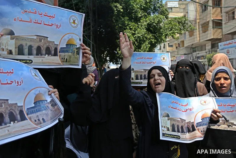 Palestinian supporters of Islamic Jihad take part in a protest against Israel's new security measures at the entrance to the al-Aqsa mosque compound, which include metal detectors and cameras, in Gaza City on July 23, 20...