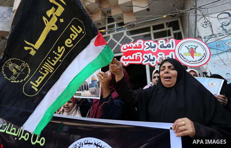 Palestinian supporters of Islamic Jihad take part in a protest against Israel's new security measures at the entrance to the al-Aqsa mosque compound, which include metal detectors and cameras, in Gaza City on July 23, 20...