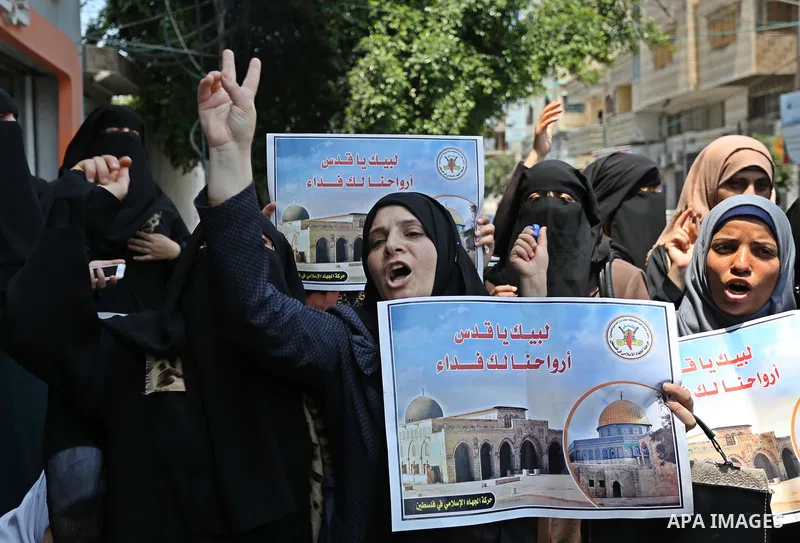 Palestinian supporters of Islamic Jihad take part in a protest against Israel's new security measures at the entrance to the al-Aqsa mosque compound, which include metal detectors and cameras, in Gaza City on July 23, 20...