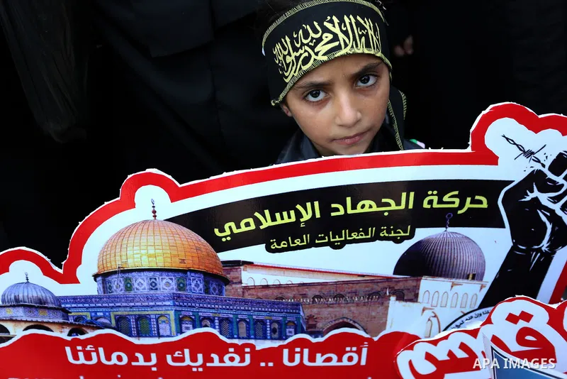 Palestinian supporters of Islamic Jihad take part in a protest against Israel's new security measures at the entrance to the al-Aqsa mosque compound, which include metal detectors and cameras, in Gaza City on July 23, 20...