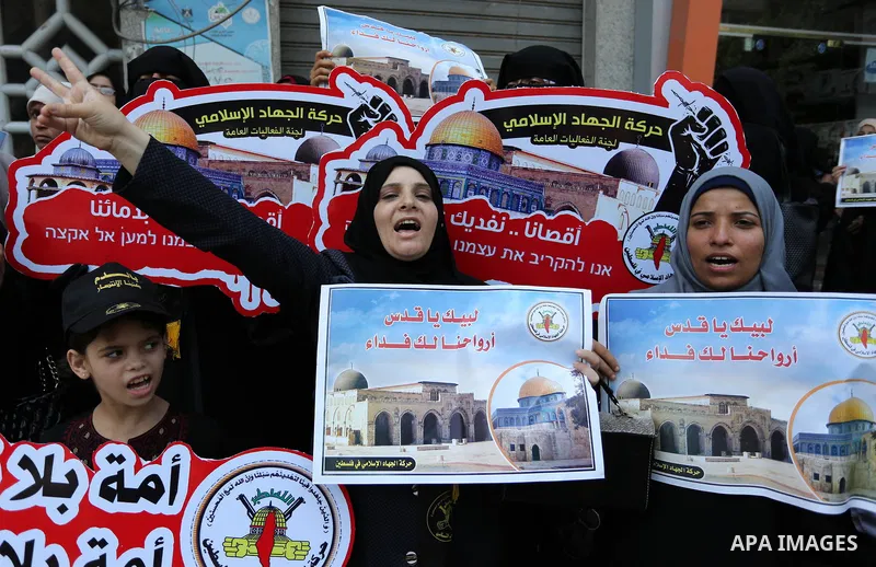 Palestinian supporters of Islamic Jihad take part in a protest against Israel's new security measures at the entrance to the al-Aqsa mosque compound, which include metal detectors and cameras, in Gaza City on July 23, 20...
