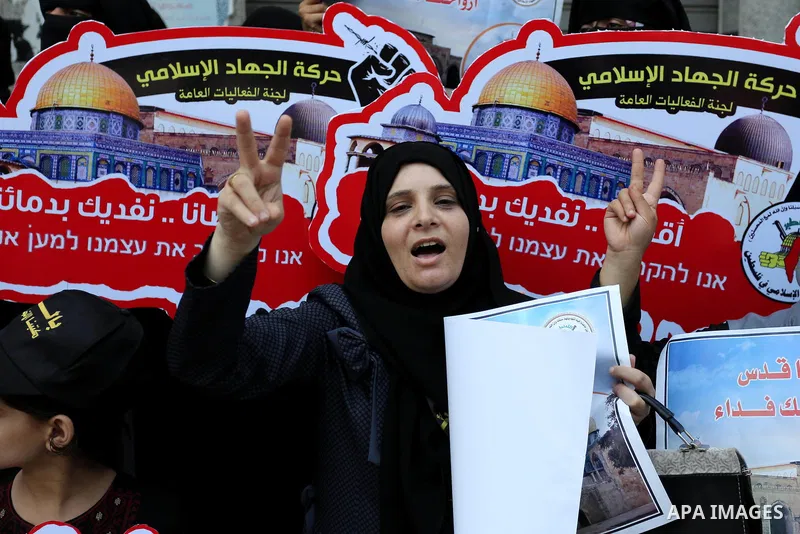 Palestinian supporters of Islamic Jihad take part in a protest against Israel's new security measures at the entrance to the al-Aqsa mosque compound, which include metal detectors and cameras, in Gaza City on July 23, 20...