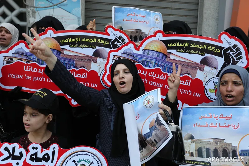 Palestinian supporters of Islamic Jihad take part in a protest against Israel's new security measures at the entrance to the al-Aqsa mosque compound, which include metal detectors and cameras, in Gaza City on July 23, 20...