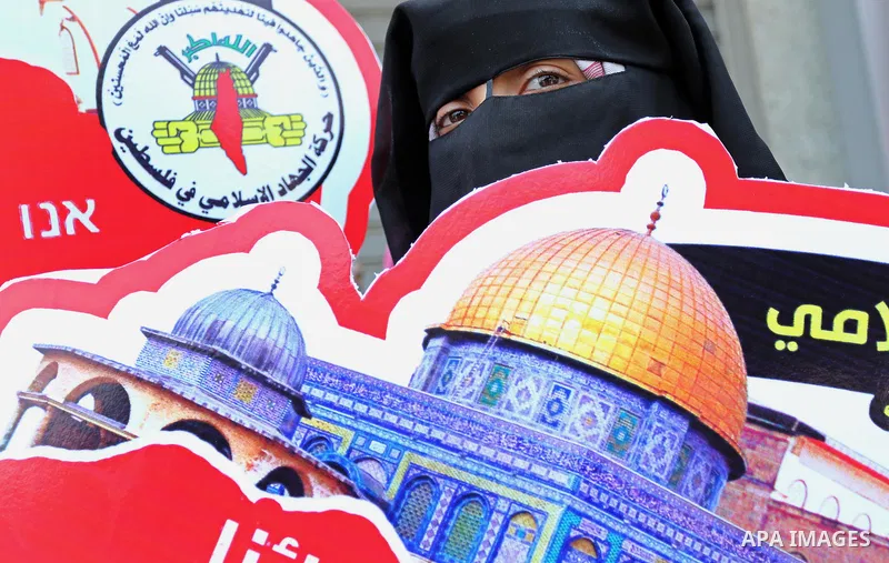 Palestinian supporters of Islamic Jihad take part in a protest against Israel's new security measures at the entrance to the al-Aqsa mosque compound, which include metal detectors and cameras, in Gaza City on July 23, 20...