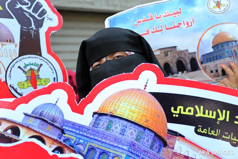 Palestinian supporters of Islamic Jihad take part in a protest against Israel's new security measures at the entrance to the al-Aqsa mosque compound, which include metal detectors and cameras, in Gaza City on July 23, 20...