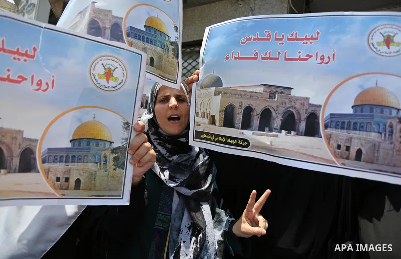 Palestinian supporters of Islamic Jihad take part in a protest against Israel's new security measures at the entrance to the al-Aqsa mosque compound, which include metal detectors and cameras, in Gaza City on July 23, 20...