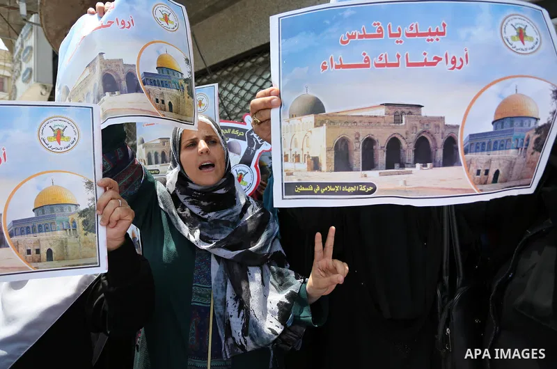 Palestinian supporters of Islamic Jihad take part in a protest against Israel's new security measures at the entrance to the al-Aqsa mosque compound, which include metal detectors and cameras, in Gaza City on July 23, 20...