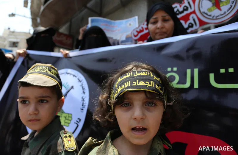 Palestinian supporters of Islamic Jihad take part in a protest against Israel's new security measures at the entrance to the al-Aqsa mosque compound, which include metal detectors and cameras, in Gaza City on July 23, 20...