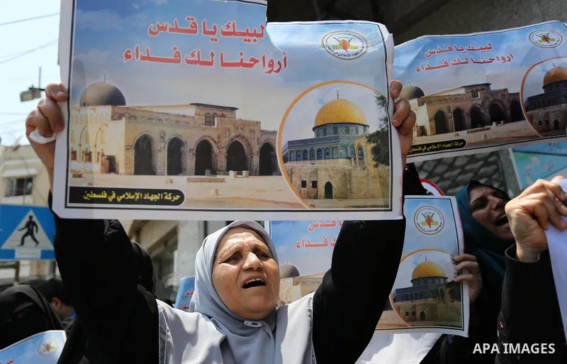 Palestinian supporters of Islamic Jihad take part in a protest against Israel's new security measures at the entrance to the al-Aqsa mosque compound, which include metal detectors and cameras, in Gaza City on July 23, 20...