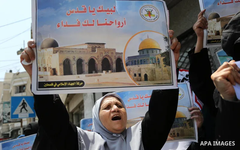 Palestinian supporters of Islamic Jihad take part in a protest against Israel's new security measures at the entrance to the al-Aqsa mosque compound, which include metal detectors and cameras, in Gaza City on July 23, 20...