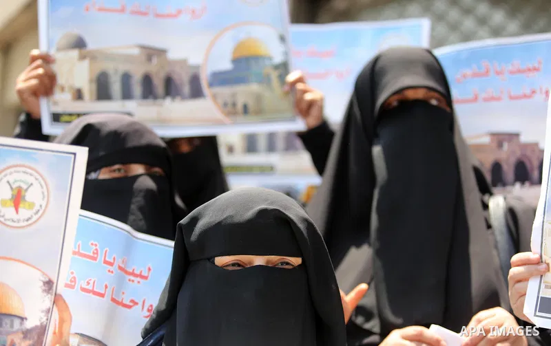Palestinian supporters of Islamic Jihad take part in a protest against Israel's new security measures at the entrance to the al-Aqsa mosque compound, which include metal detectors and cameras, in Gaza City on July 23, 20...