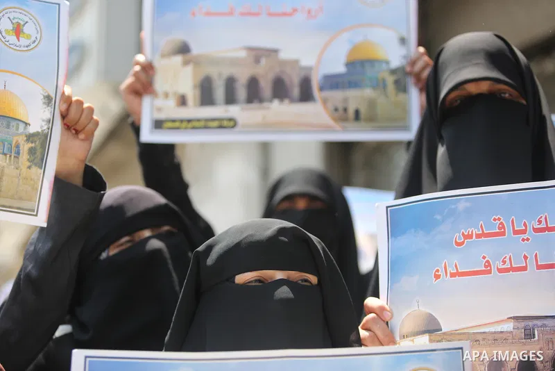 Palestinian supporters of Islamic Jihad take part in a protest against Israel's new security measures at the entrance to the al-Aqsa mosque compound, which include metal detectors and cameras, in Gaza City on July 23, 20...