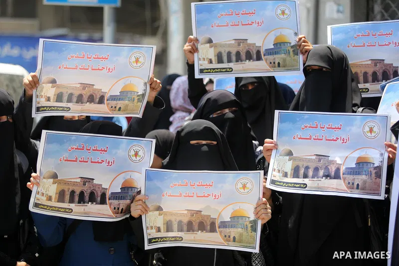 Palestinian supporters of Islamic Jihad take part in a protest against Israel's new security measures at the entrance to the al-Aqsa mosque compound, which include metal detectors and cameras, in Gaza City on July 23, 20...