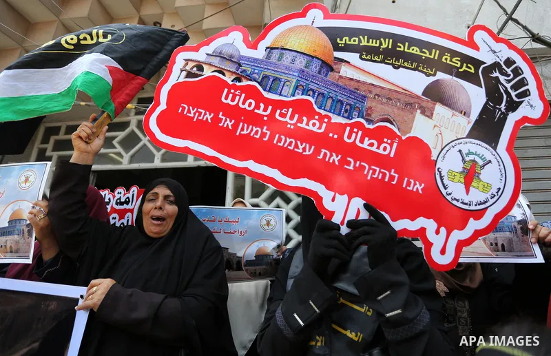 Palestinian supporters of Islamic Jihad take part in a protest against Israel's new security measures at the entrance to the al-Aqsa mosque compound, which include metal detectors and cameras, in Gaza City on July 23, 20...