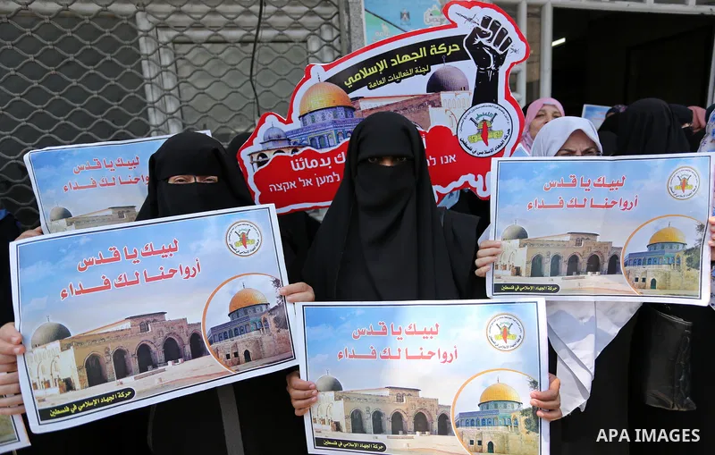 Palestinian supporters of Islamic Jihad take part in a protest against Israel's new security measures at the entrance to the al-Aqsa mosque compound, which include metal detectors and cameras, in Gaza City on July 23, 20...
