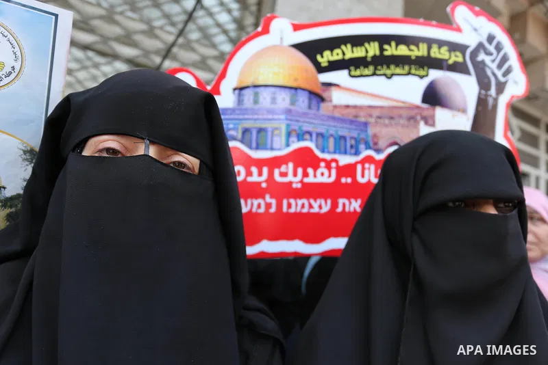 Palestinian supporters of Islamic Jihad take part in a protest against Israel's new security measures at the entrance to the al-Aqsa mosque compound, which include metal detectors and cameras, in Gaza City on July 23, 20...