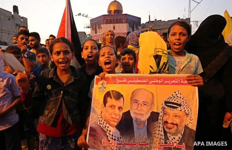 Palestinians take part in a protest against Israel's newly-installed security measures at the entrance to the al-Aqsa mosque compound, in Khan Younis in the southern Gaza Strip July 23, 2017. Photo by Ashraf Amra