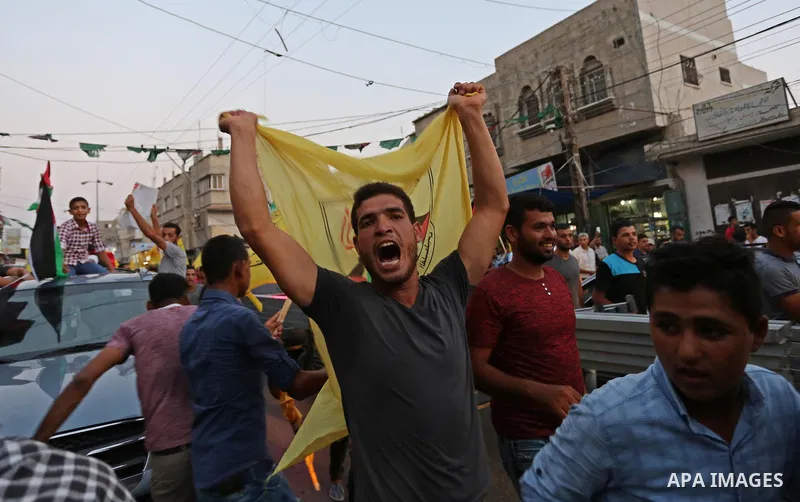 Palestinians take part in a protest against Israel's newly-installed security measures at the entrance to the al-Aqsa mosque compound, in Khan Younis in the southern Gaza Strip July 23, 2017. Photo by Ashraf Amra