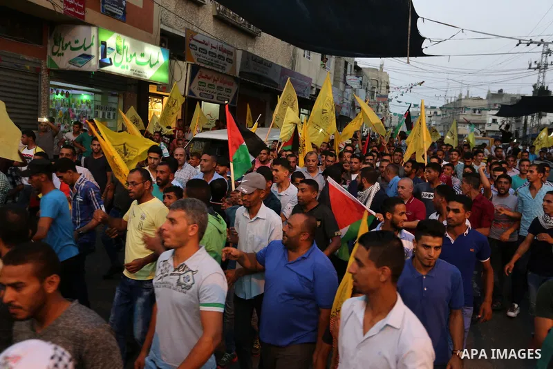 Palestinians take part in a protest against Israel's newly-installed security measures at the entrance to the al-Aqsa mosque compound, in Khan Younis in the southern Gaza Strip July 23, 2017. Photo by Ashraf Amra