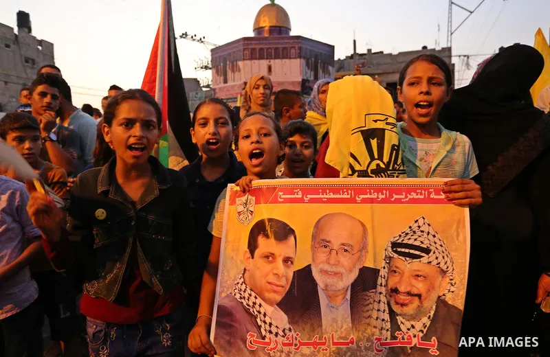 Palestinians take part in a protest against Israel's newly-installed security measures at the entrance to the al-Aqsa mosque compound, in Khan Younis in the southern Gaza Strip July 23, 2017. Photo by Ashraf Amra