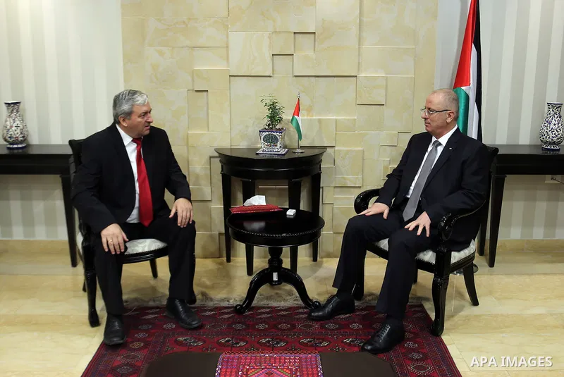 Palestinian Prime minister, Rami Hamdallah, meets with a representative of Bulgaria to Palestine Sfilin Boganov, in the West Bank city of Ramallah, on July 24, 2017. Photo by Prime Minister Office