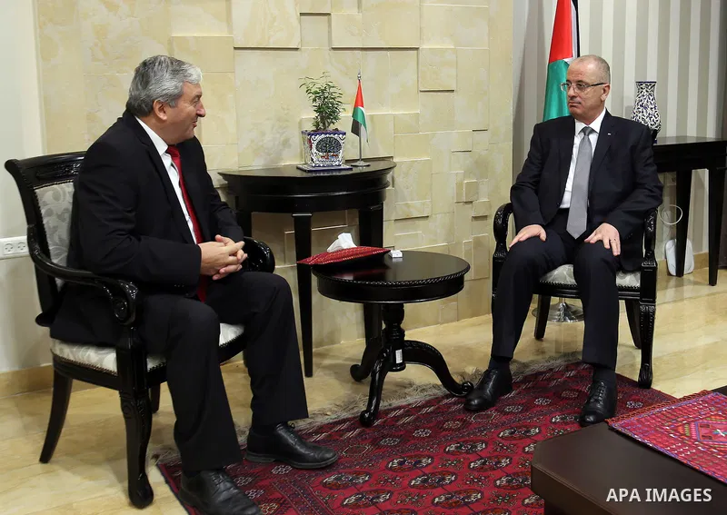 Palestinian Prime minister, Rami Hamdallah, meets with a representative of Bulgaria to Palestine Sfilin Boganov, in the West Bank city of Ramallah, on July 24, 2017. Photo by Prime Minister Office
