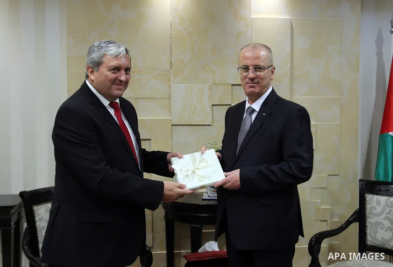 Palestinian Prime minister, Rami Hamdallah, meets with a representative of Bulgaria to Palestine Sfilin Boganov, in the West Bank city of Ramallah, on July 24, 2017. Photo by Prime Minister Office