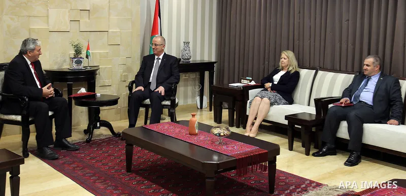 Palestinian Prime minister, Rami Hamdallah, meets with a representative of Bulgaria to Palestine Sfilin Boganov, in the West Bank city of Ramallah, on July 24, 2017. Photo by Prime Minister Office