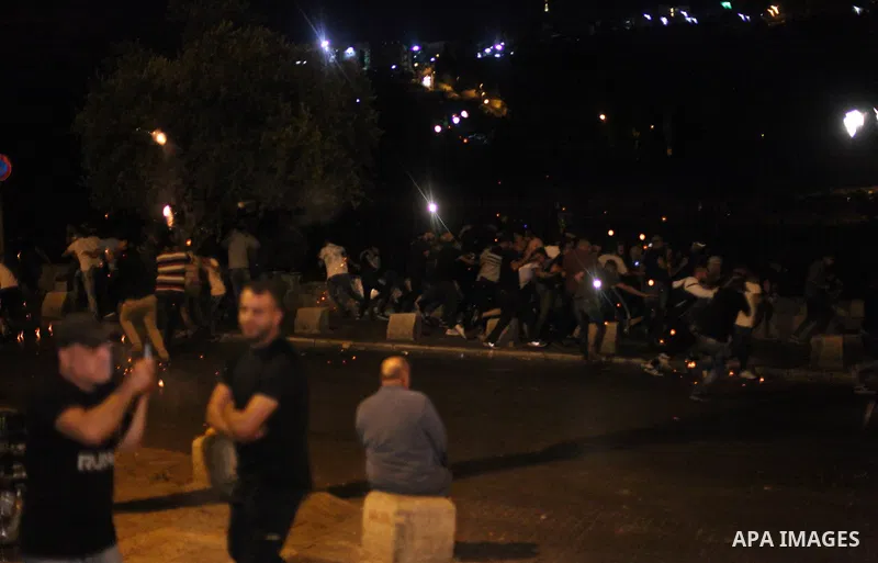 Israeli security forces clash with Palestinians outside Lions' Gate, a main entrance to the Al-Aqsa mosque compound in Jerusalem's Old City, on July 24, 2017, in protest against new Israeli security measures implemented...