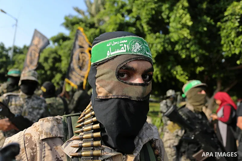 Palestinian militants from different local factions take part in a military parade against Israel in Gaza City on July 25, 2017. Photo by Ashraf Amra