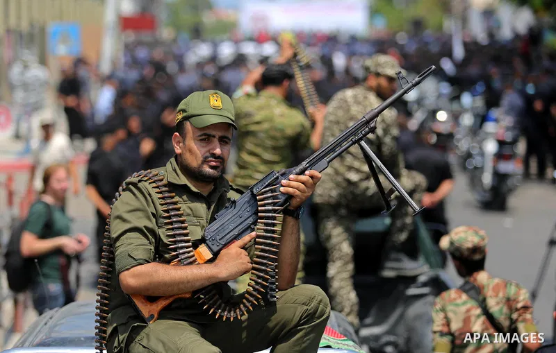 Members of Palestinian forces in Gaza strip take part in a military parade in Gaza City on July 26, 2017 as a tense standoff is underway between Israel and Muslim worshippers at Jerusalem's Al-Aqsa compound. Muslims have...